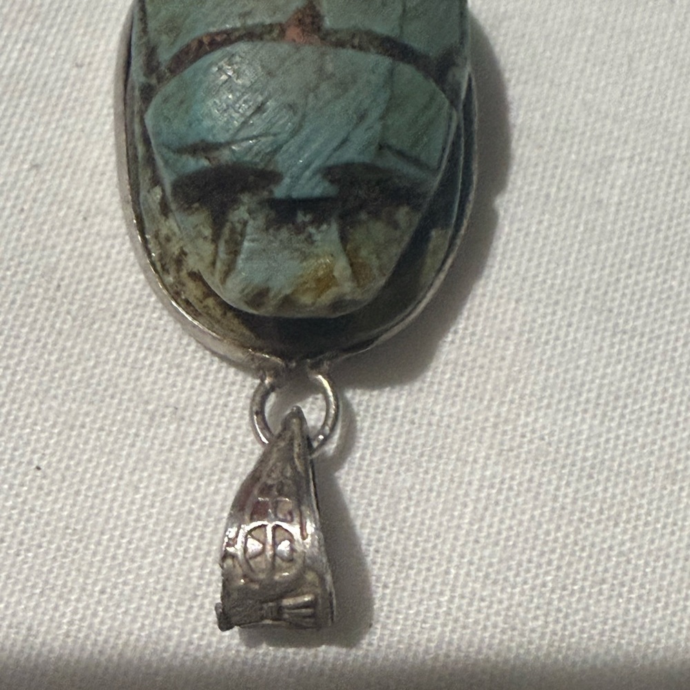 Silver pendant with blue stone antique